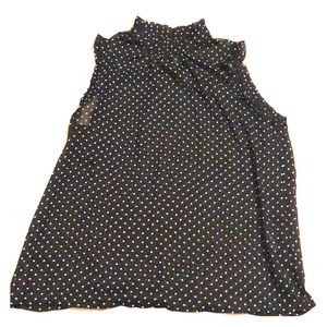 Sleeveless high collared black white polka dot top